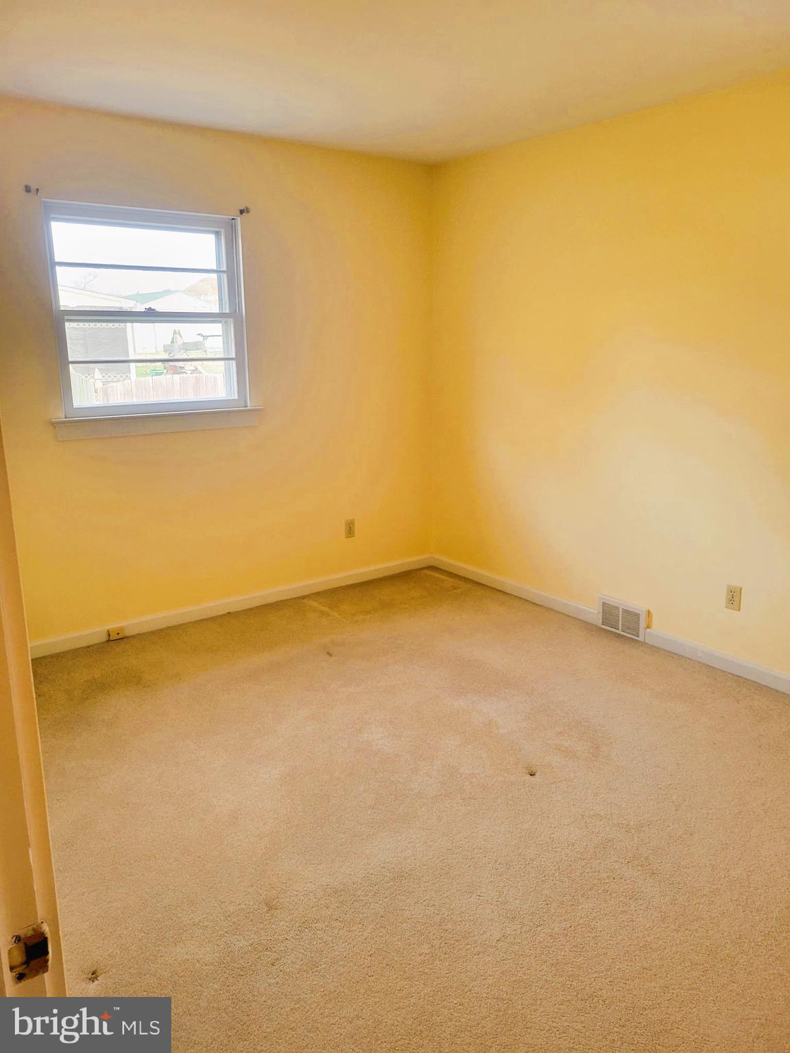24 Nestler Road Bridgeton, NJ 08302 - Photo 16 of 41 a view of an empty room and a window