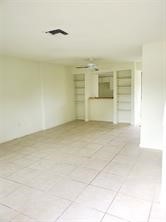 7839 Fuqua Street, Unit 7839 Houston, TX 77075 - Photo 1 of 10 an empty room with a empty space