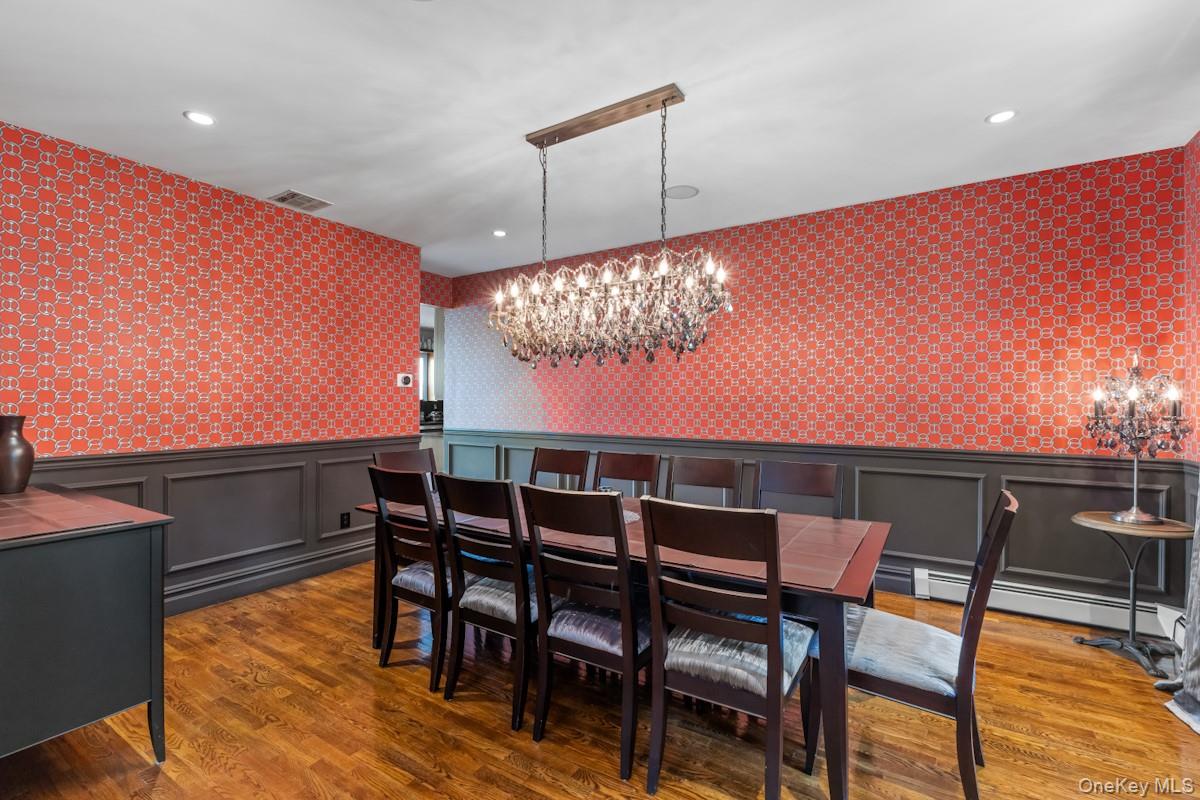 9 Ronwood Road Chestnut Ridge, NY 10977 - Photo 13 of 48 a view of a dining room with furniture and wooden floor