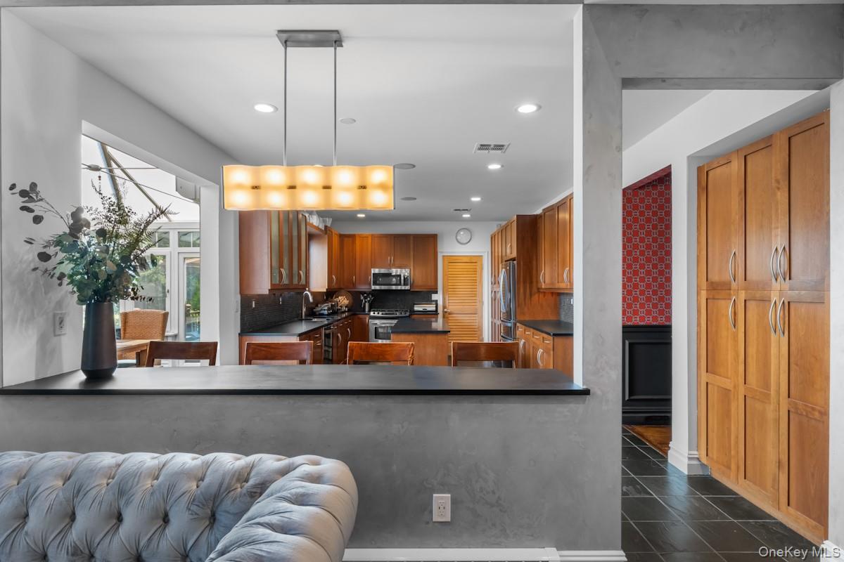 9 Ronwood Road Chestnut Ridge, NY 10977 - Photo 16 of 48 a view of a living room and kitchen view
