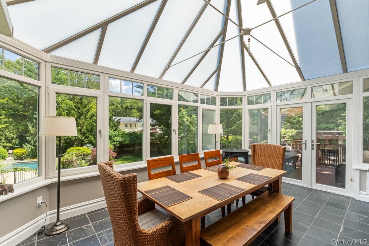 9 Ronwood Road Chestnut Ridge, NY 10977 - Photo 17 of 48 a view of a dining room with furniture window and outside view