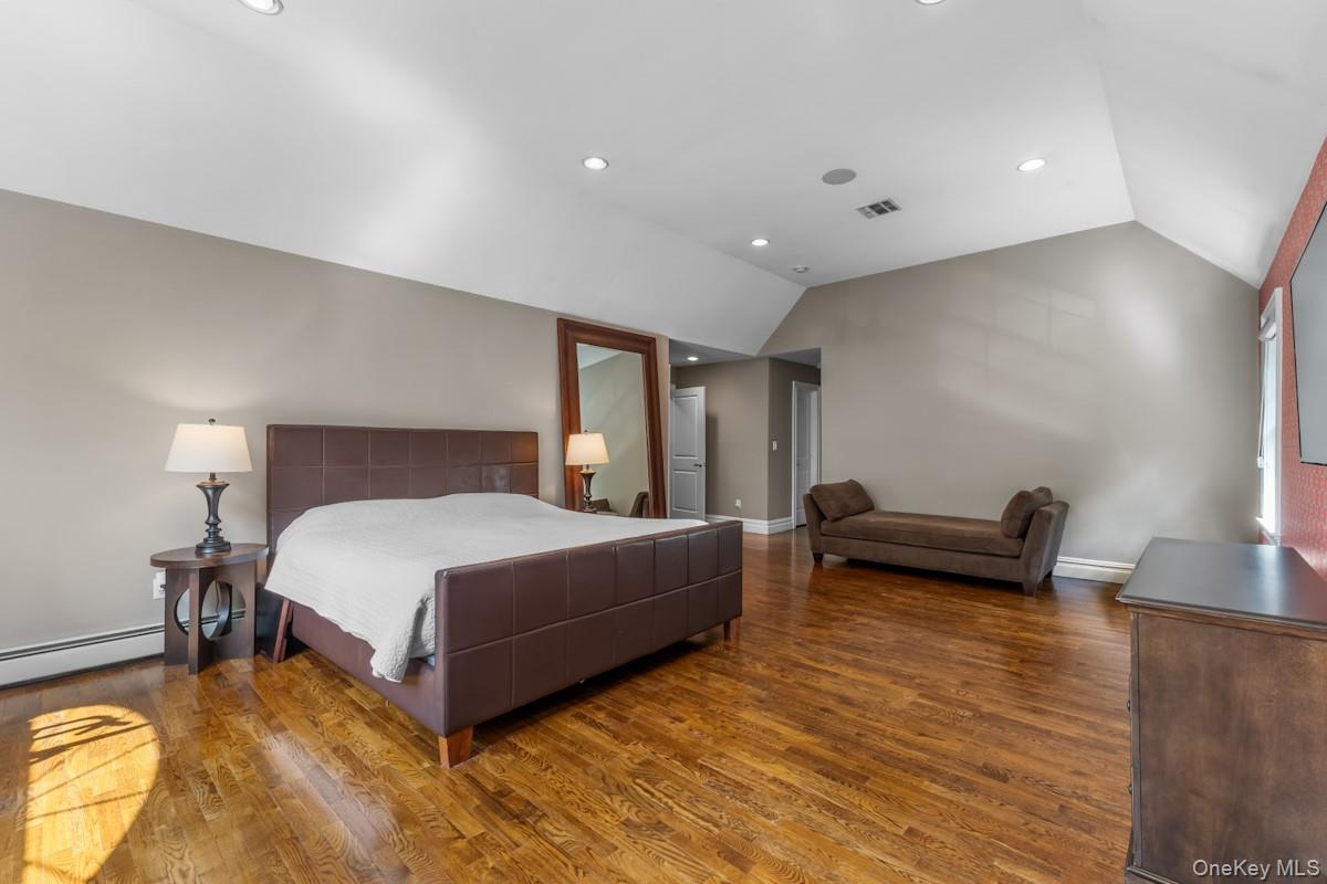 9 Ronwood Road Chestnut Ridge, NY 10977 - Photo 24 of 48 a bedroom with a bed and a couch