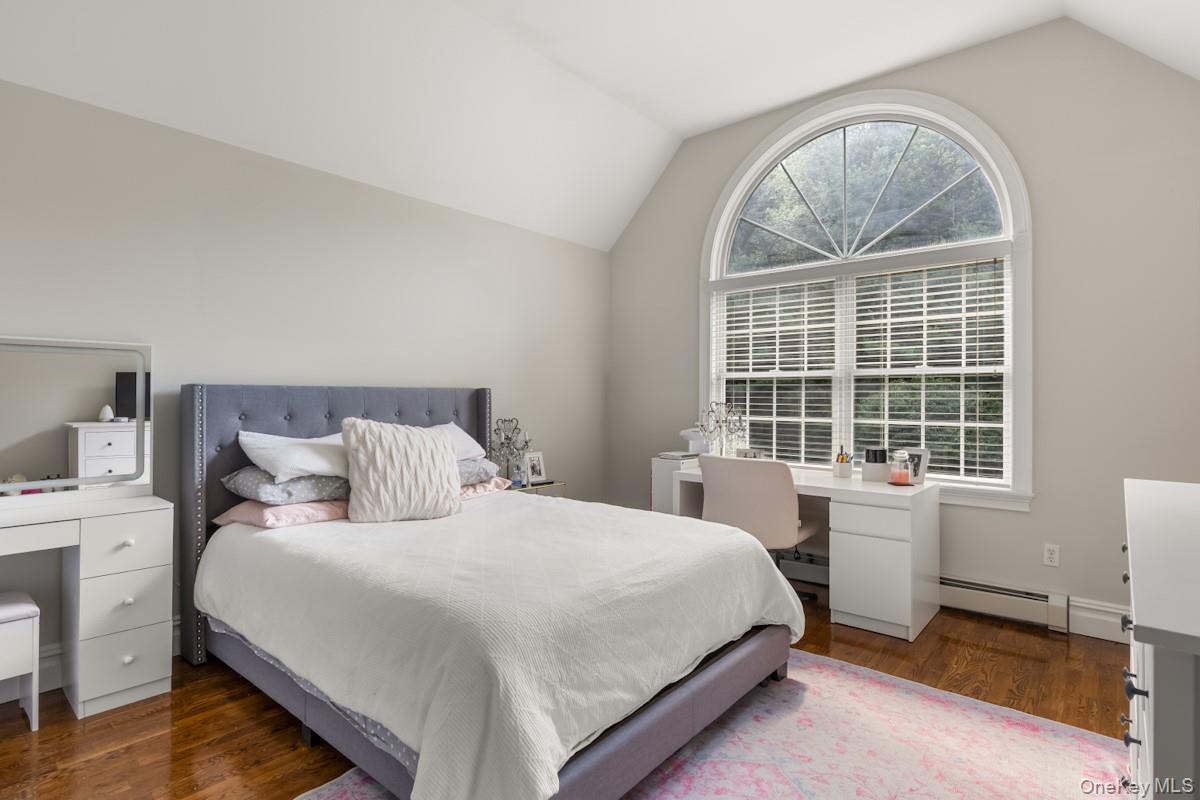 9 Ronwood Road Chestnut Ridge, NY 10977 - Photo 29 of 48 a bedroom with a bed and a large window