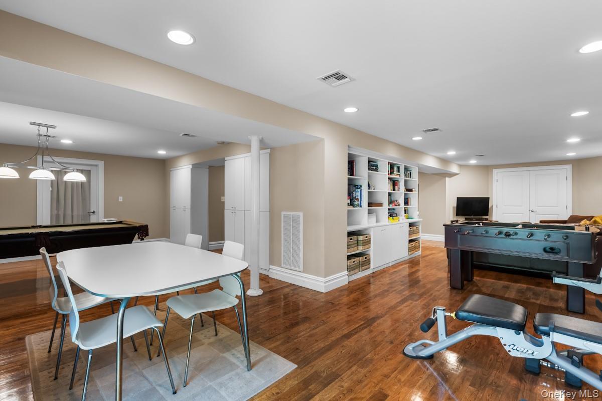 9 Ronwood Road Chestnut Ridge, NY 10977 - Photo 36 of 48 a living room with furniture and wooden floor