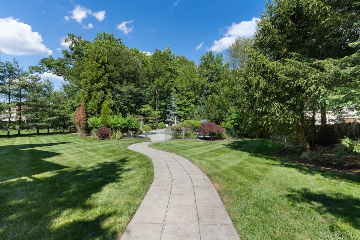 9 Ronwood Road Chestnut Ridge, NY 10977 - Photo 40 of 48 a view of a garden with a fountain