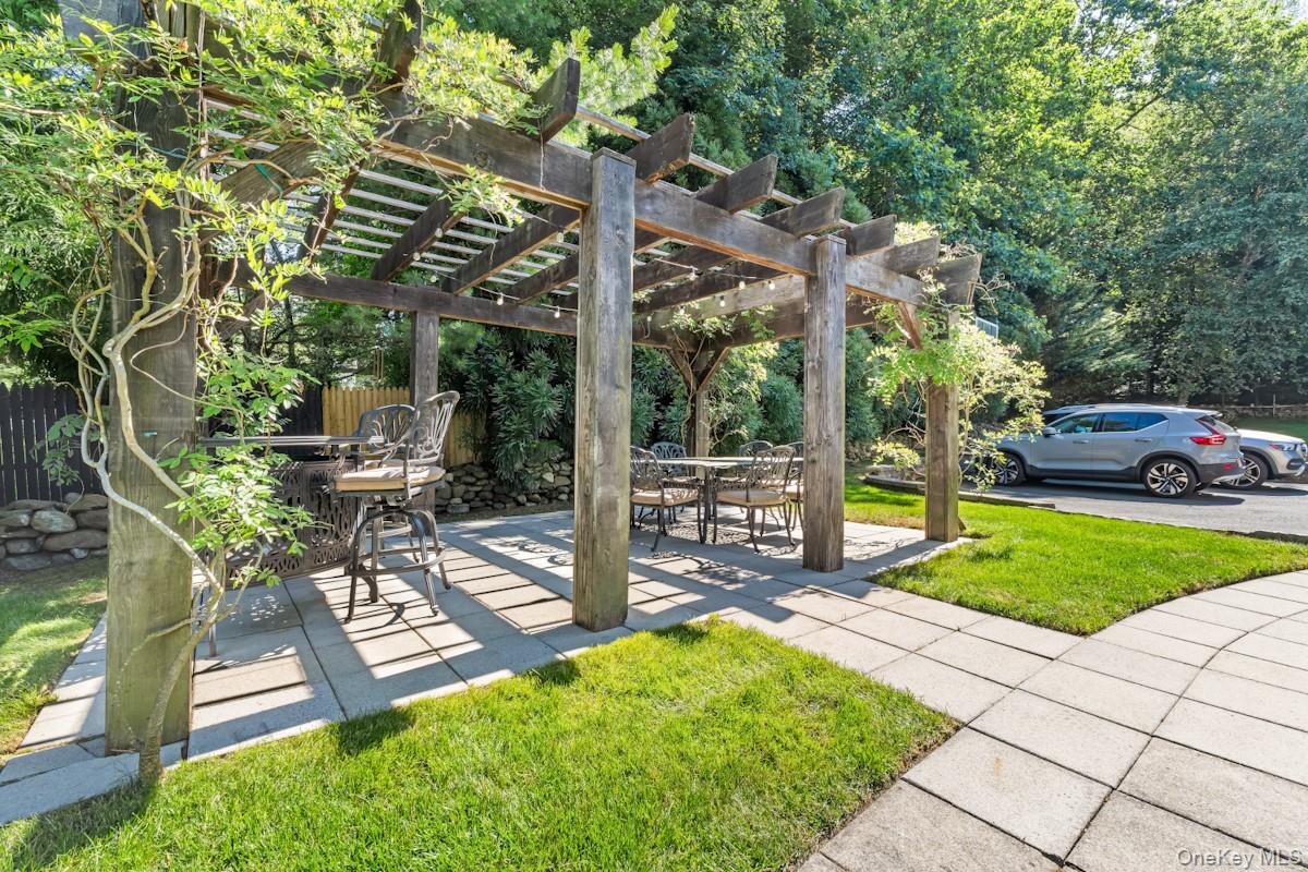9 Ronwood Road Chestnut Ridge, NY 10977 - Photo 41 of 48 a view of a chair and table in backyard of the house
