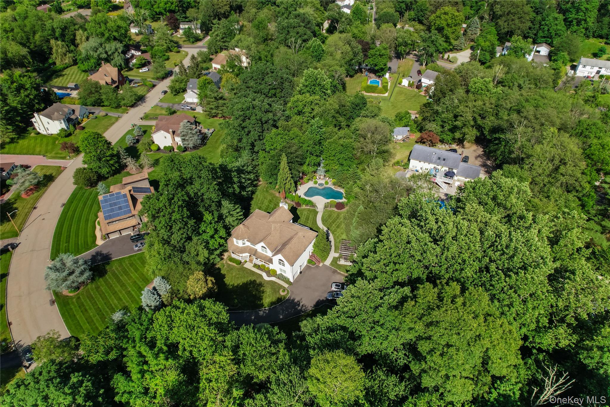 9 Ronwood Road Chestnut Ridge, NY 10977 - Photo 7 of 48 an aerial view of residential house with outdoor space and trees all around