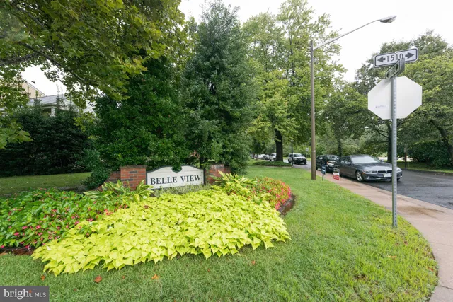 a garden view with a seating space