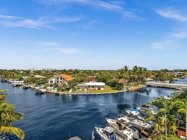 a view of a swimming pool with sitting area