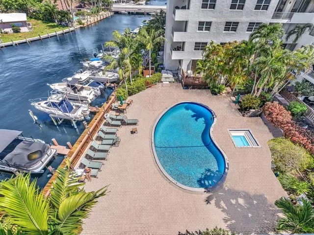 a view of a lake with a city skyline in the background