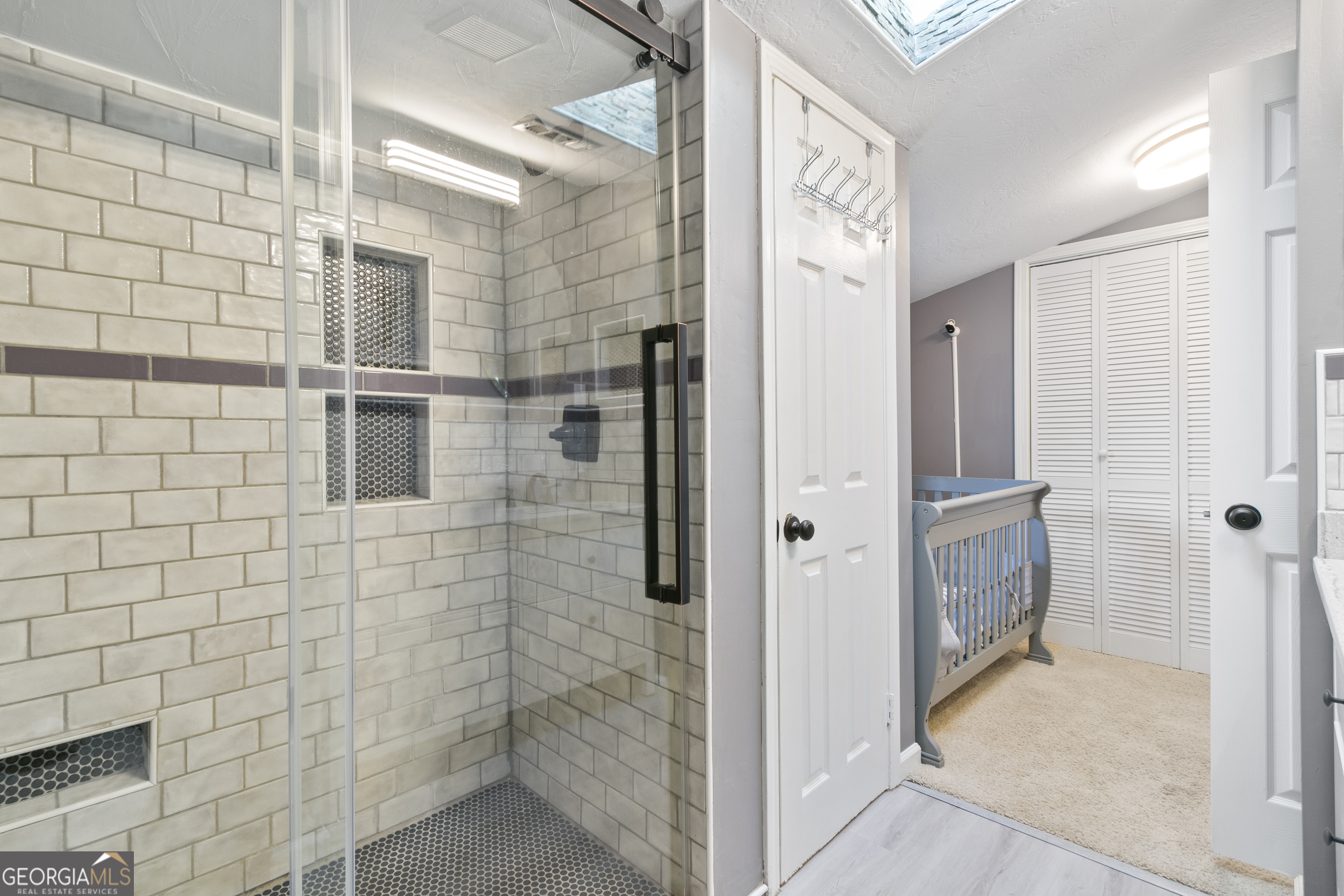 61 Clark Street Newnan, GA 30263 - Photo 11 of 37 a bathroom with a shower and a sink