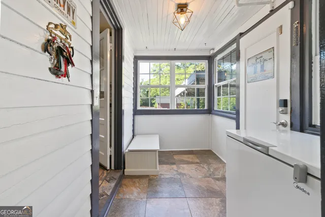 a view of a room with a large window