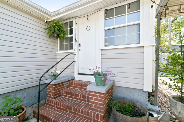 a house view with a garden space