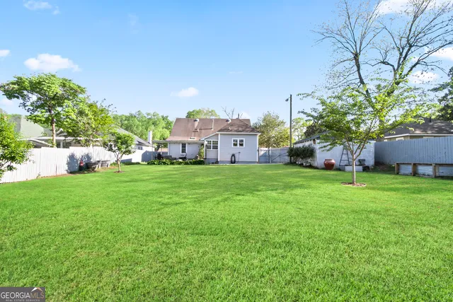 a house view with a garden space