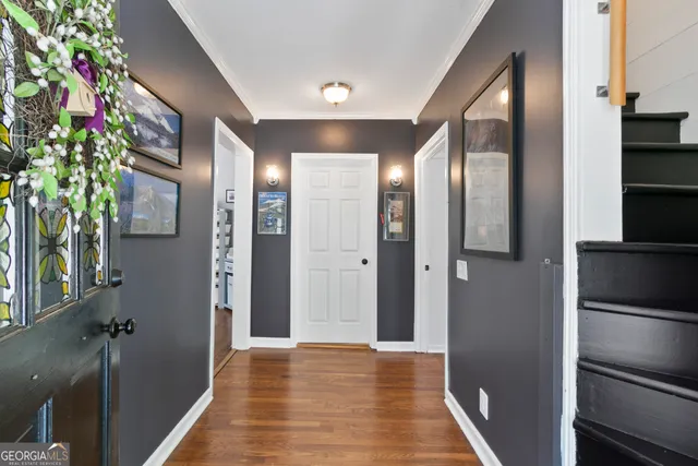 a view of hallway with a large mirror