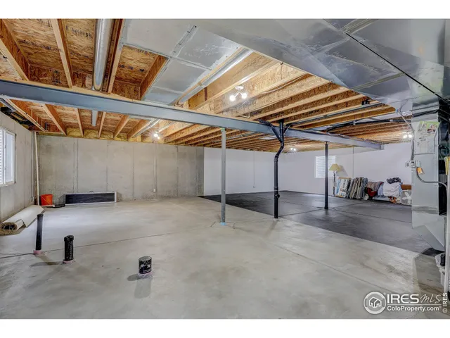 a view of an empty room with storage