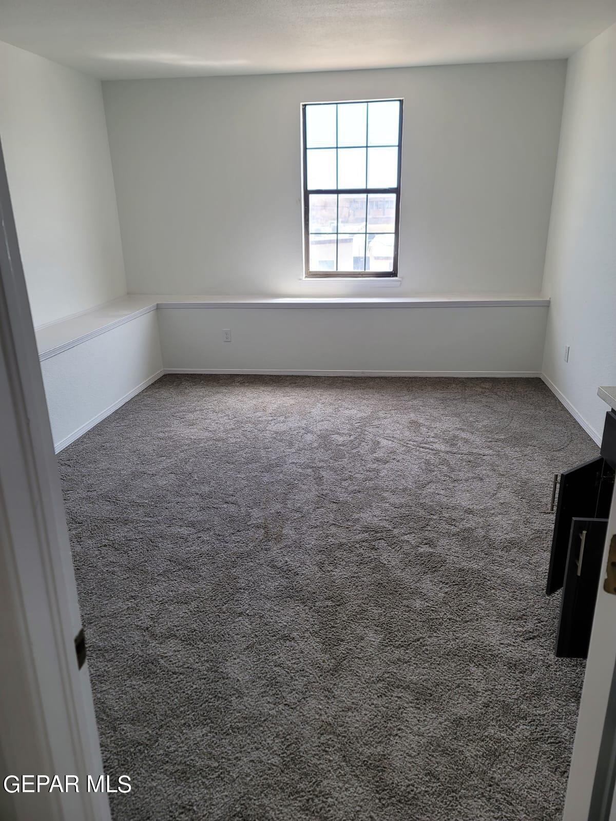 324 Valley Fair Way El Paso, TX 79907 - Photo 22 of 82 an empty room with a fireplace