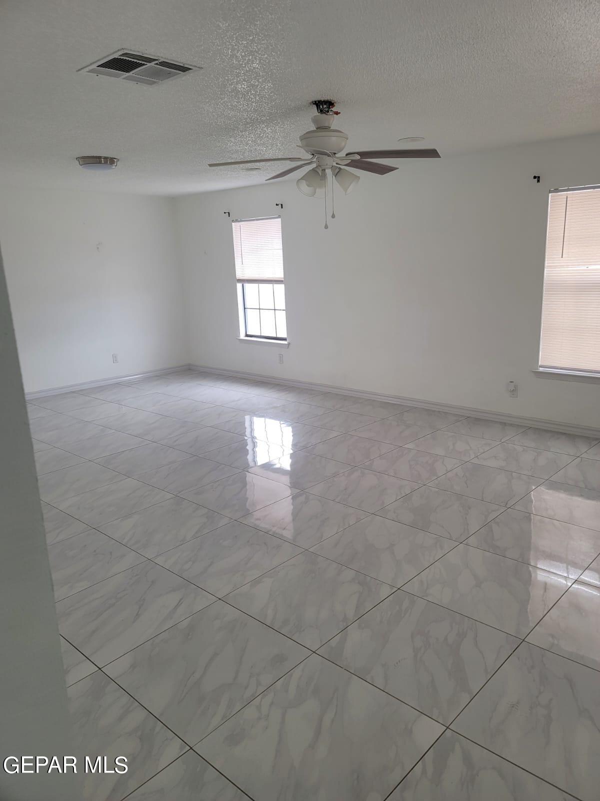 324 Valley Fair Way El Paso, TX 79907 - Photo 31 of 82 a view of an empty room with a window