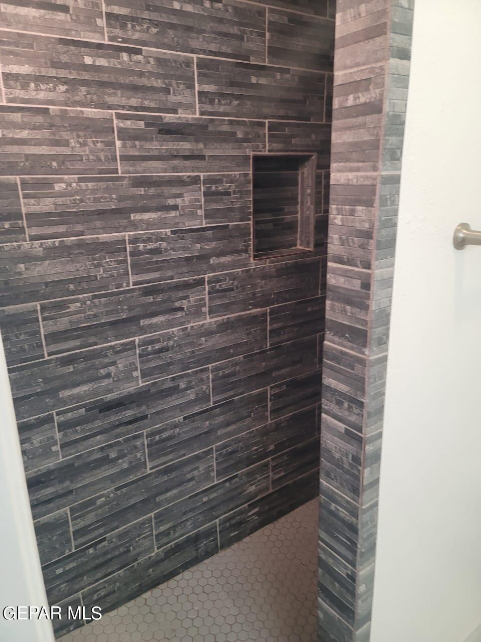 324 Valley Fair Way El Paso, TX 79907 - Photo 68 of 82 a bathroom with a shower