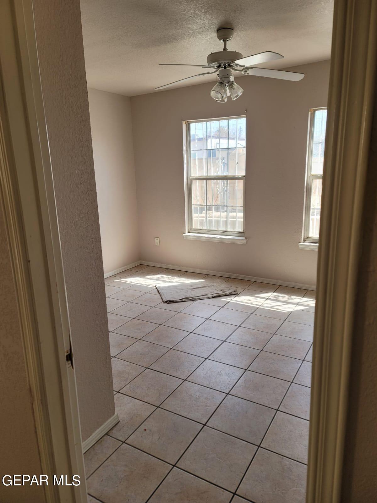 324 Valley Fair Way El Paso, TX 79907 - Photo 78 of 82 a view of an empty room with a window