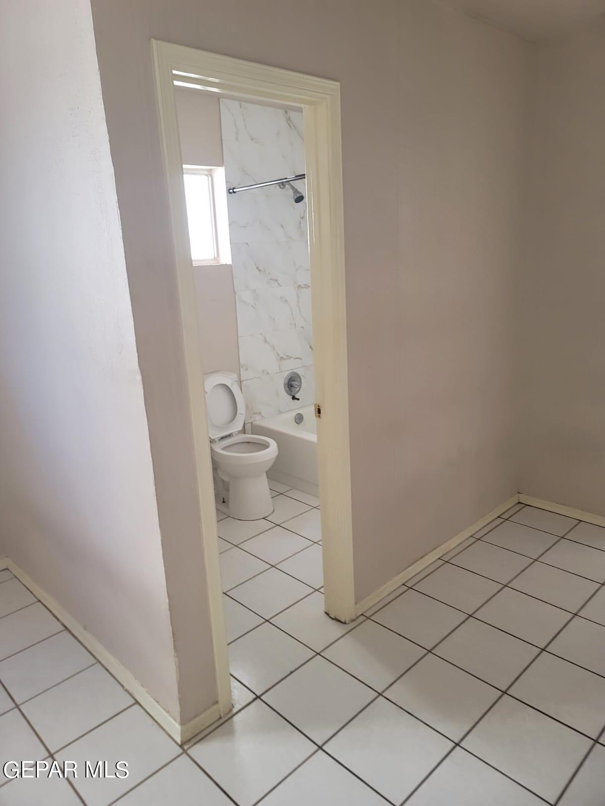 324 Valley Fair Way El Paso, TX 79907 - Photo 82 of 82 a bathroom with a toilet and a shower