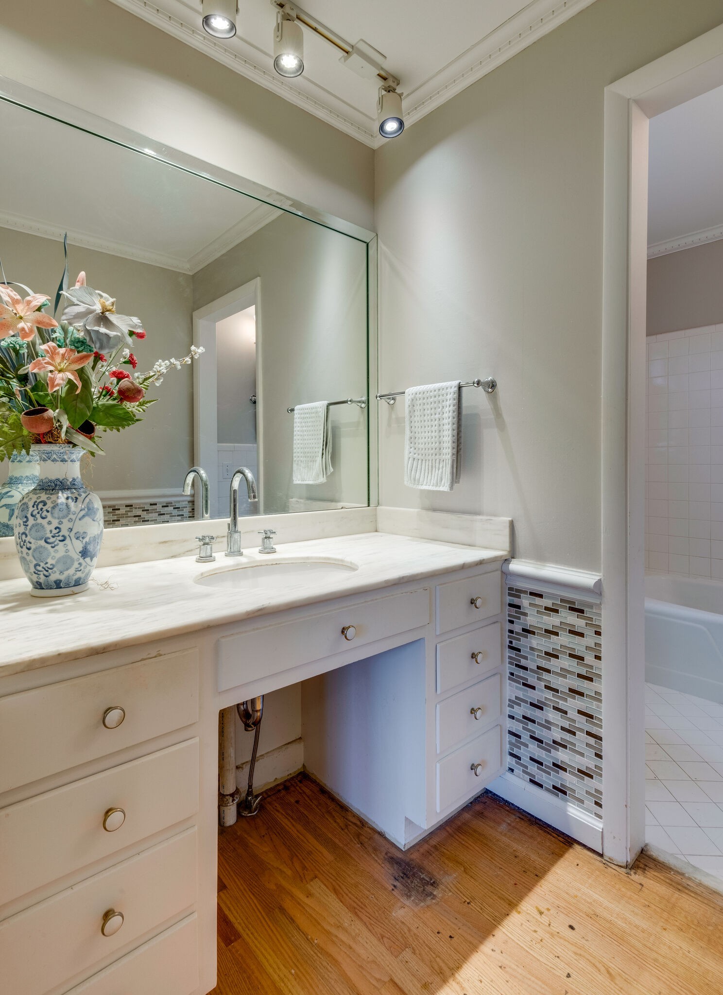 5927 Post Road Nashville, TN 37205 - Photo 18 of 22 a bathroom with a sink double vanity and a mirror