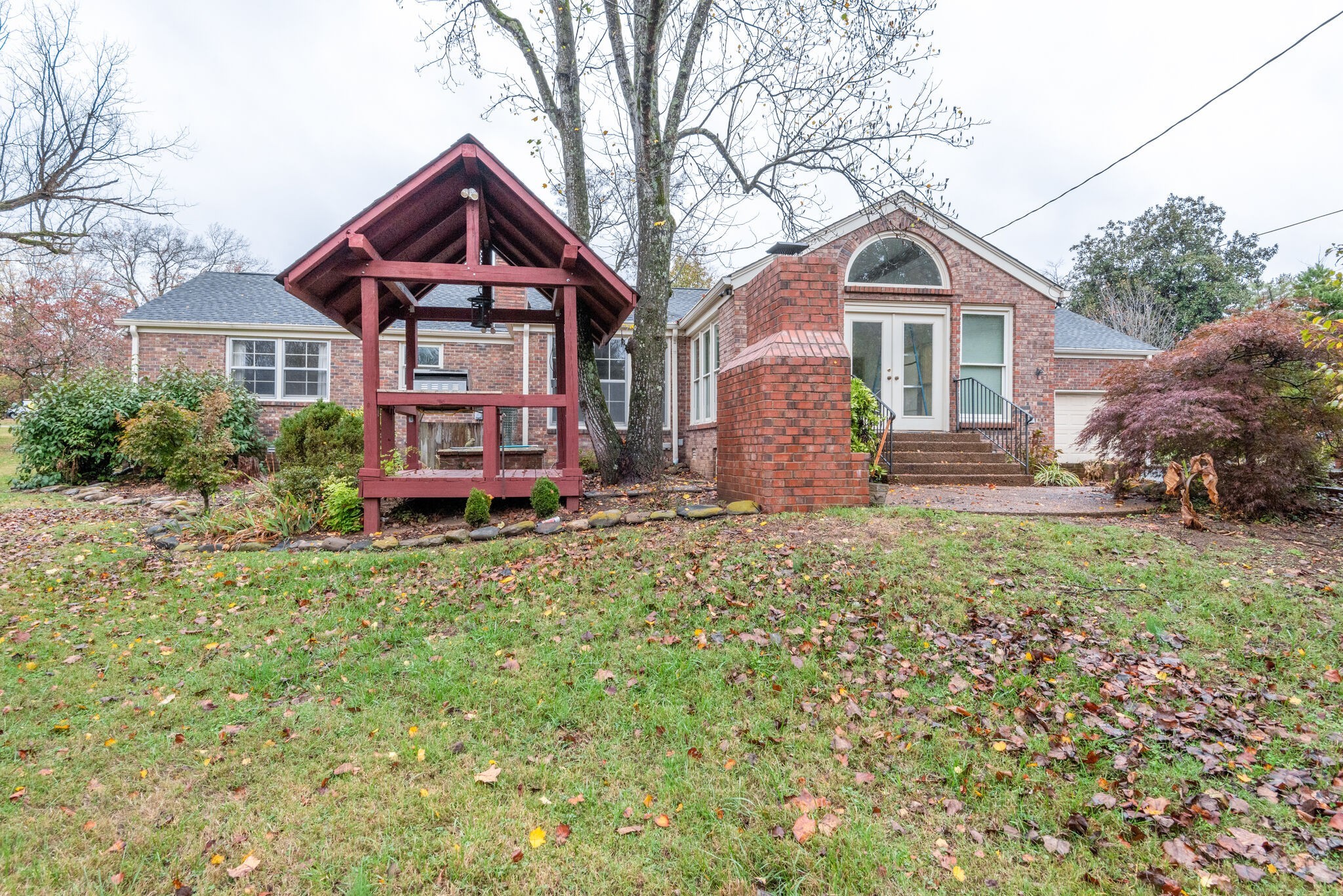 5927 Post Road Nashville, TN 37205 - Photo 21 of 22 a front view of a house with garden