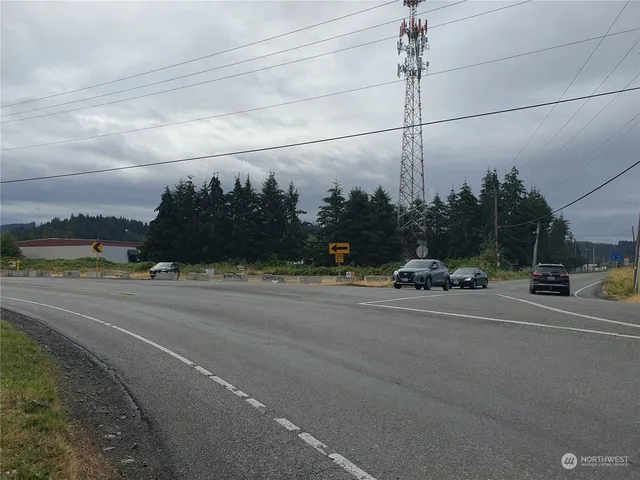 a view of a city street with a building