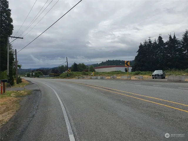a view of a city street with a building