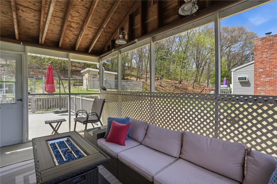 144 Blackrock Road Coventry, RI 02816 - Photo 25 of 33 Enclosed porch