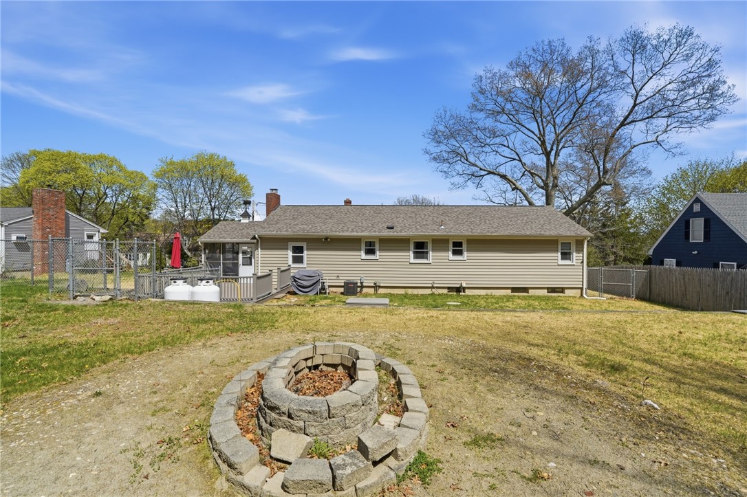 144 Blackrock Road Coventry, RI 02816 - Photo 28 of 33 Exterior rear and yard with firepit