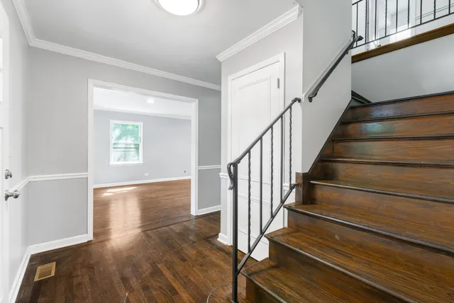 a view of entryway with wooden floor
