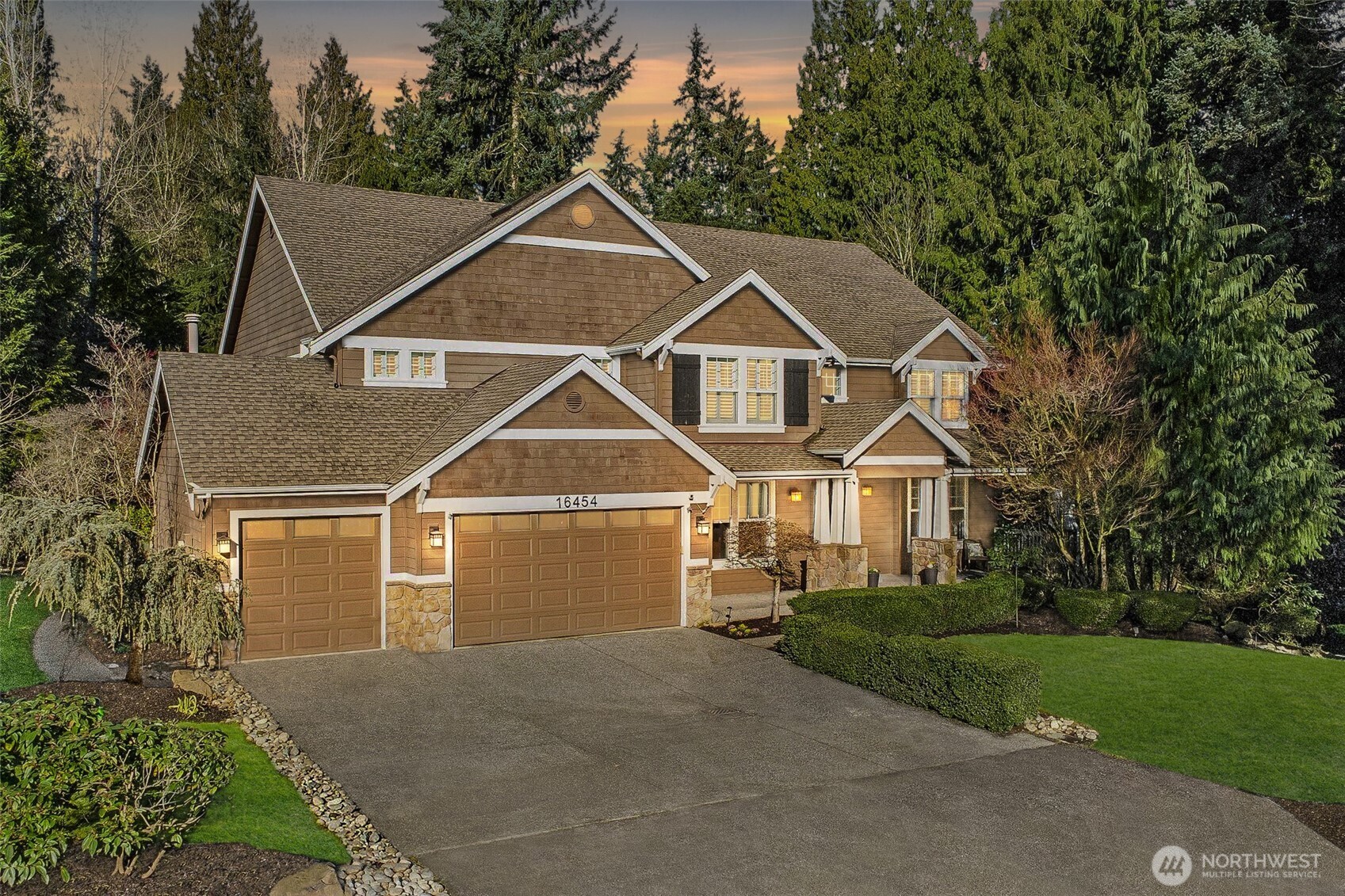 16454 108th Avenue Northeast Bothell, WA 98011 - Photo 1 of 40 a front view of a house with a yard