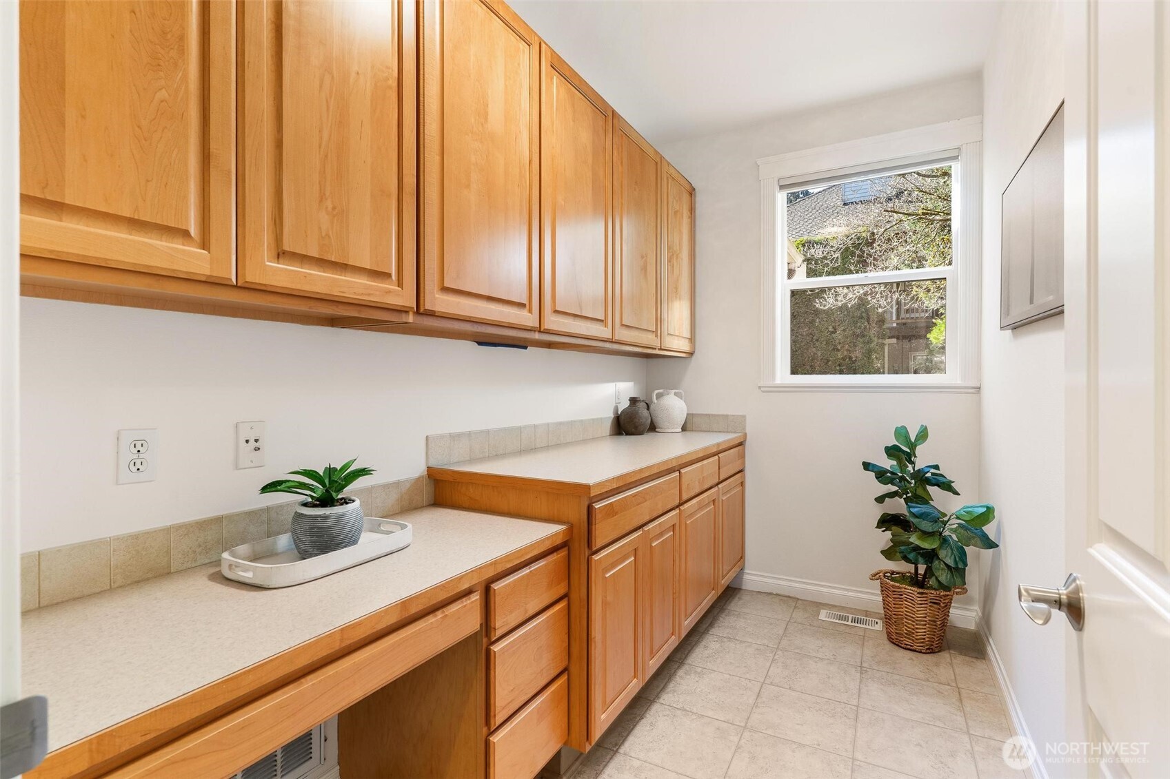 16454 108th Avenue Northeast Bothell, WA 98011 - Photo 14 of 40 a kitchen with stainless steel appliances granite countertop a sink a stove and a window