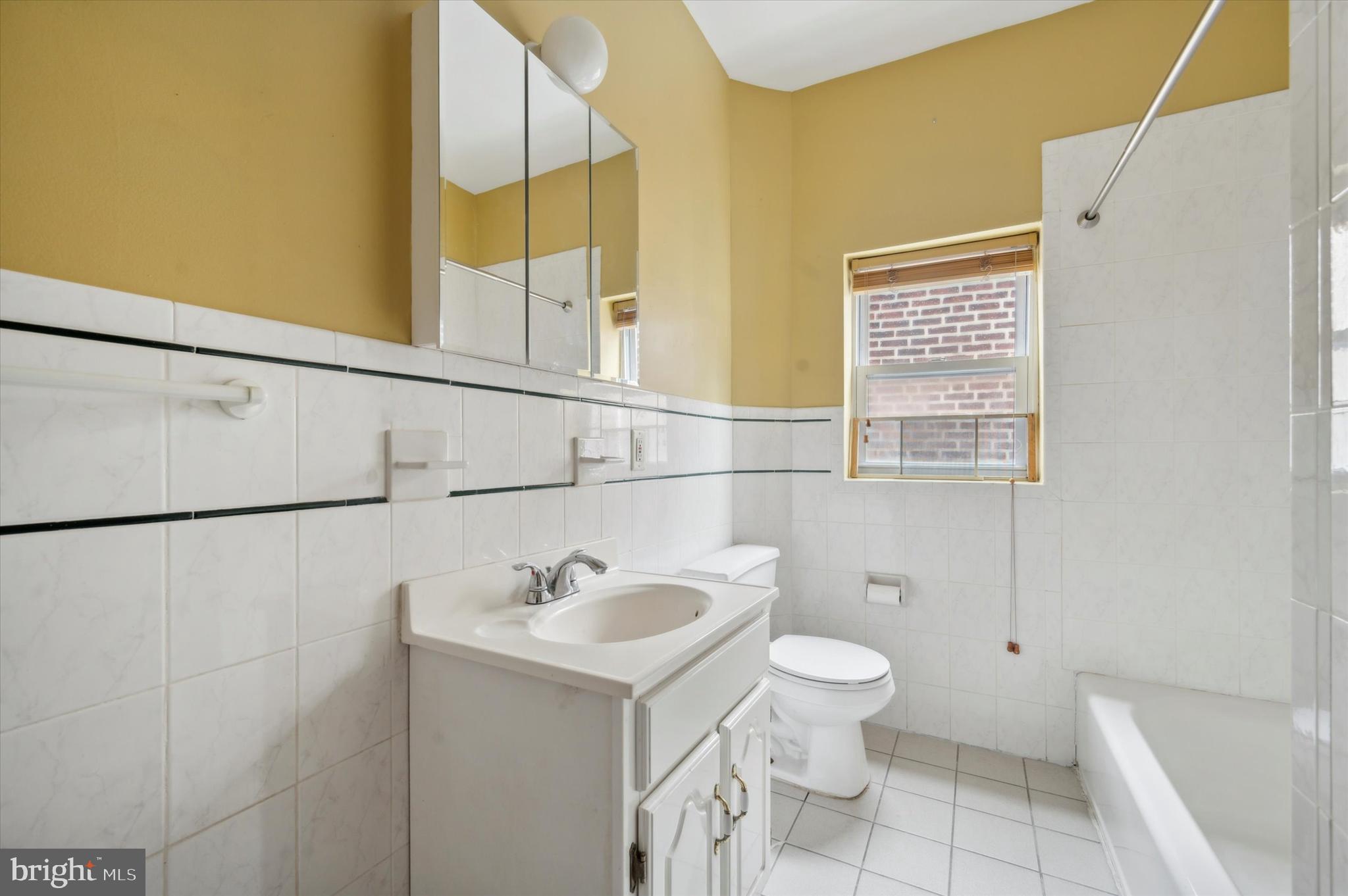 519 South 17th Street, Unit 3 Philadelphia, PA 19146 - Photo 4 of 8 a bathroom with a sink and a toilet