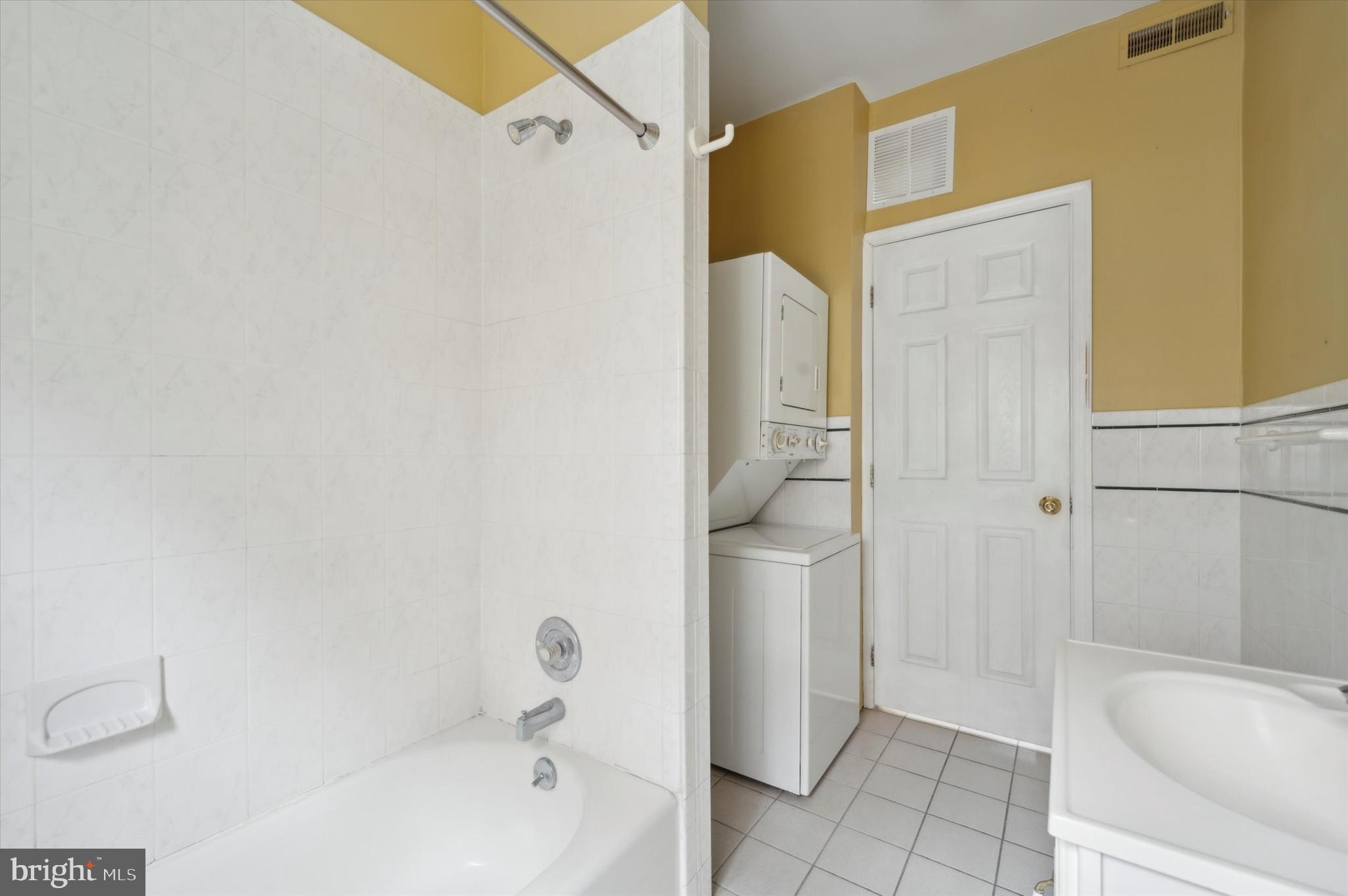 519 South 17th Street, Unit 3 Philadelphia, PA 19146 - Photo 5 of 8 a bathroom with a bathtub and a shower