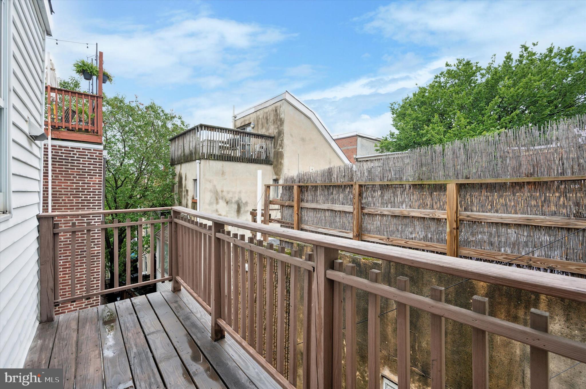 519 South 17th Street, Unit 3 Philadelphia, PA 19146 - Photo 8 of 8 a view of a balcony with wooden floor