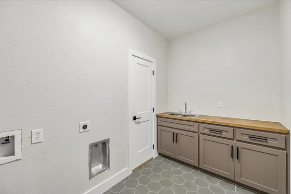 a view of cabinets with wooden floor