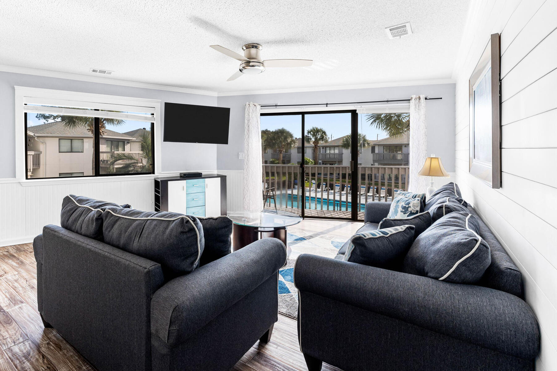 285 Payne Street, Unit 19B Destin, FL 32550 - Photo 7 of 29 a living room with furniture and a large window