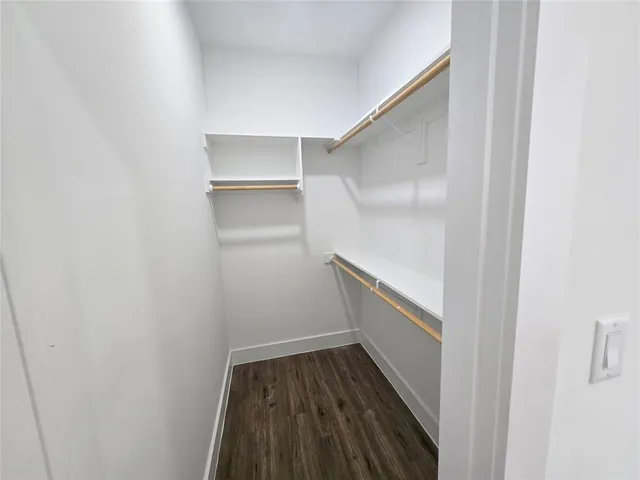a view of an empty walk in closet