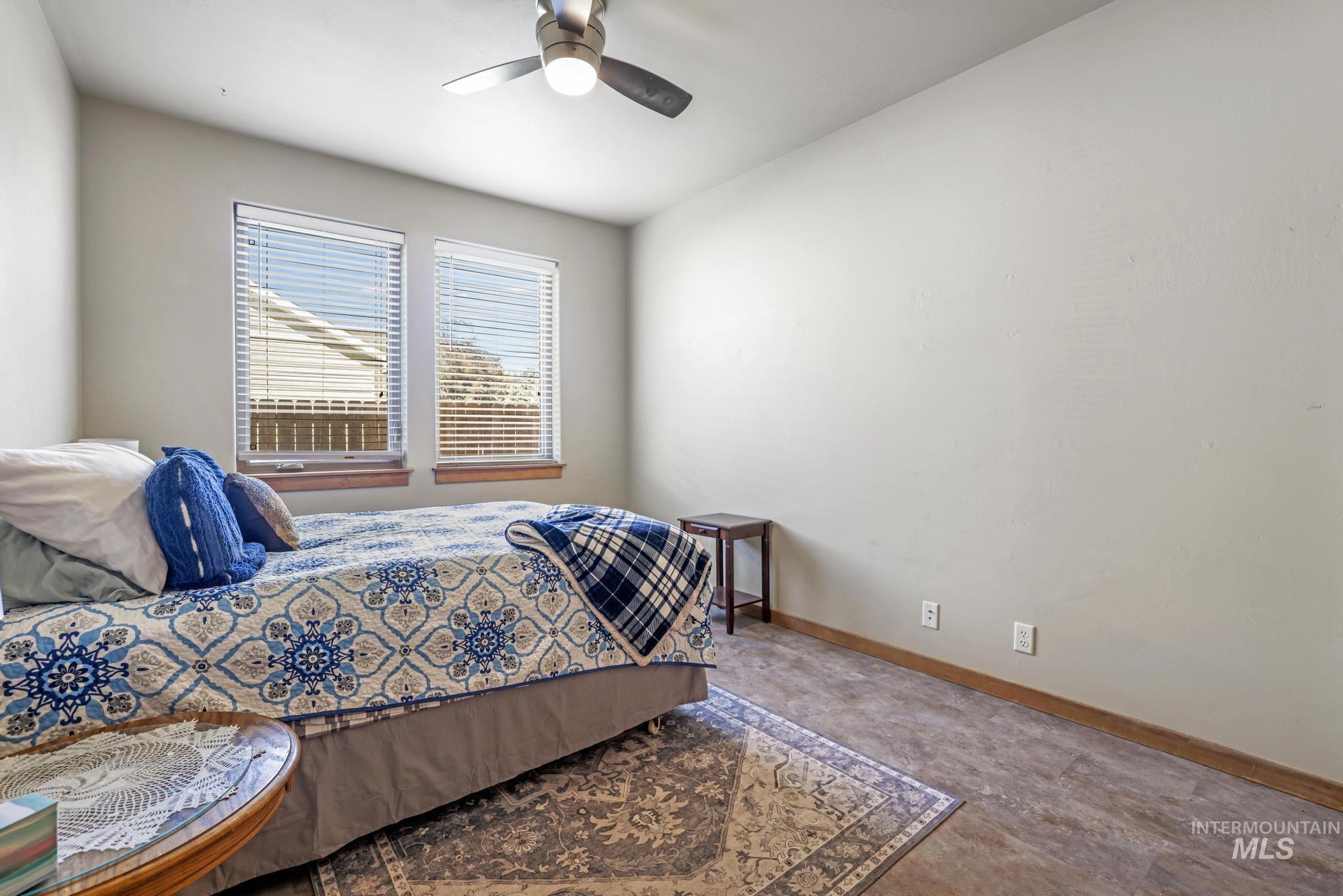 205 Edwards Drive Twin Falls, ID 83301 - Photo 26 of 49 Bedroom featuring baseboards and ceiling fan