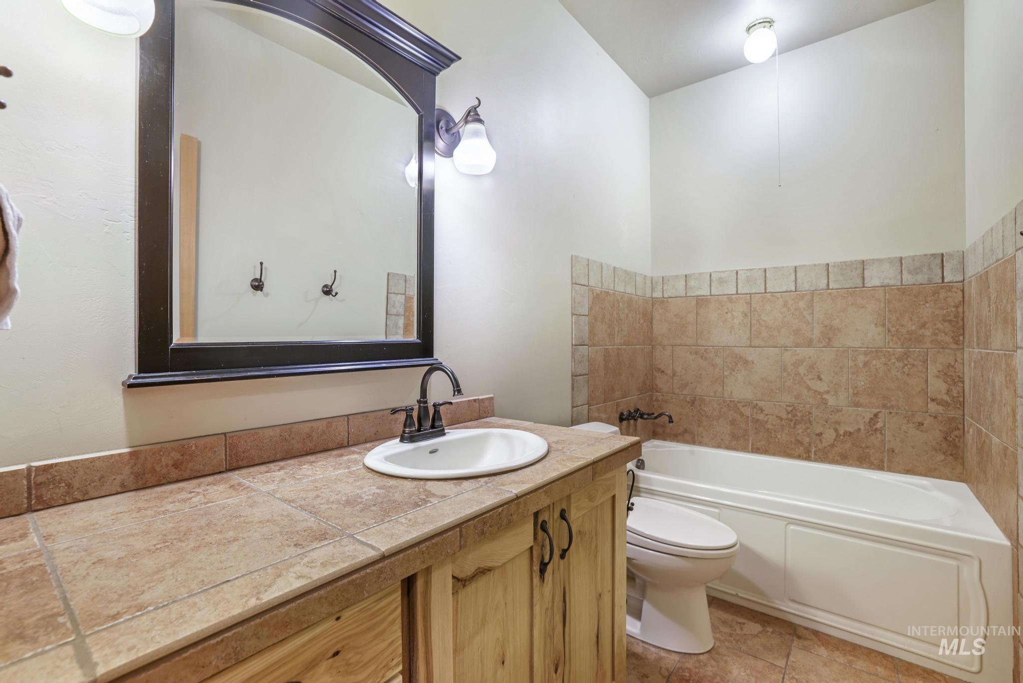 205 Edwards Drive Twin Falls, ID 83301 - Photo 28 of 49 Bathroom featuring vanity and light tile patterned floors
