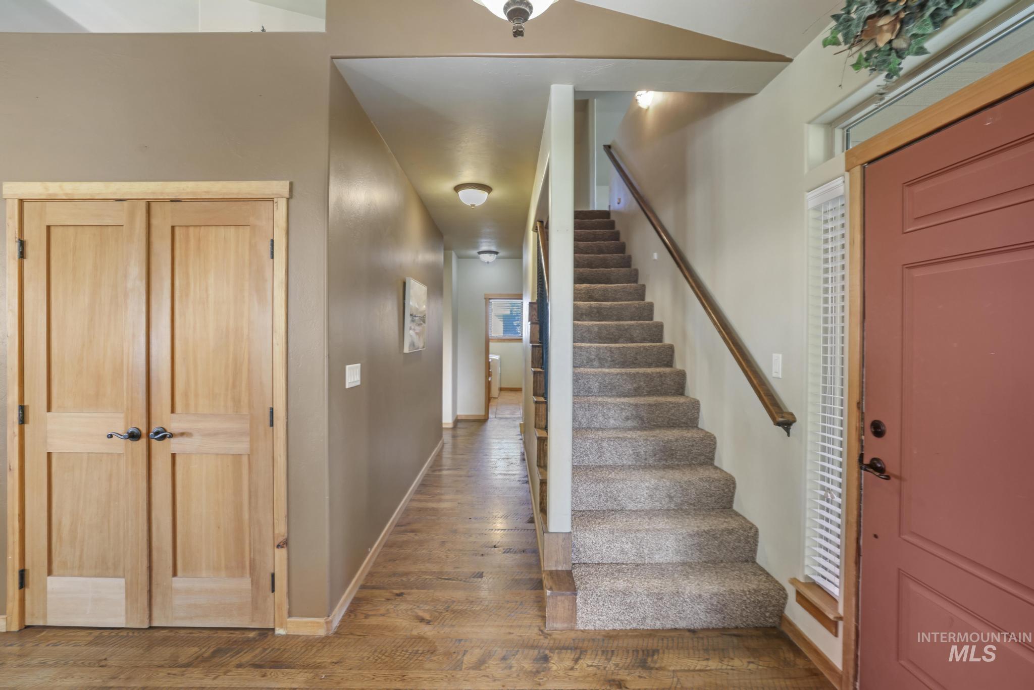 205 Edwards Drive Twin Falls, ID 83301 - Photo 29 of 49 Stairs with wood-type flooring and baseboards