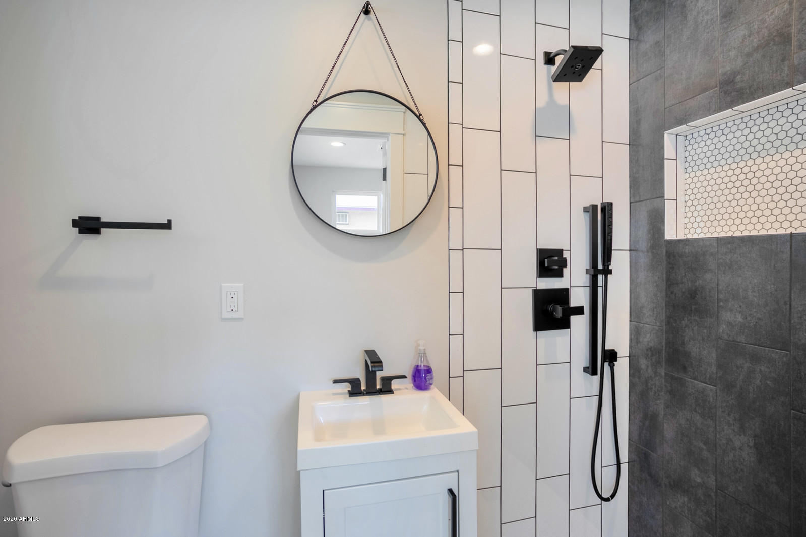 4917 East Granada Road Phoenix, AZ 85008 - Photo 11 of 18 a bathroom with a sink toilet and shower