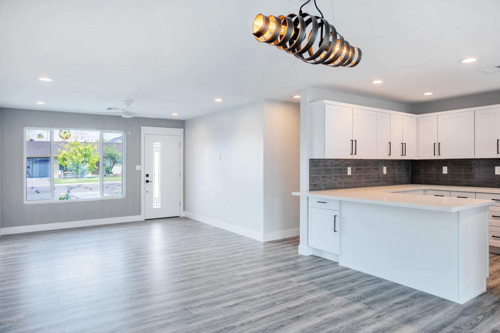 4917 East Granada Road Phoenix, AZ 85008 - Photo 3 of 18 a view of kitchen and front door
