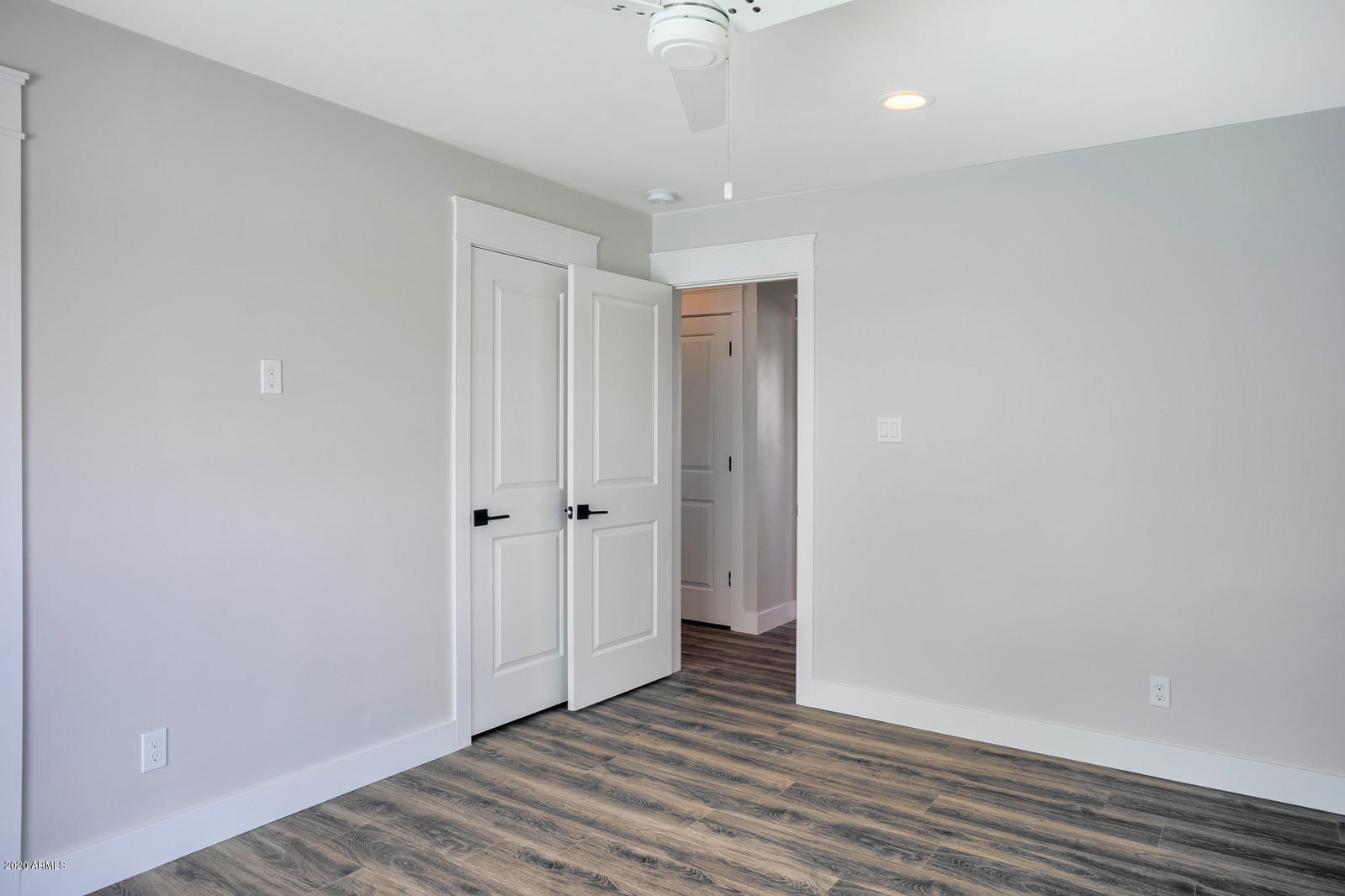 4917 East Granada Road Phoenix, AZ 85008 - Photo 10 of 18 a view of a livingroom with wooden floor