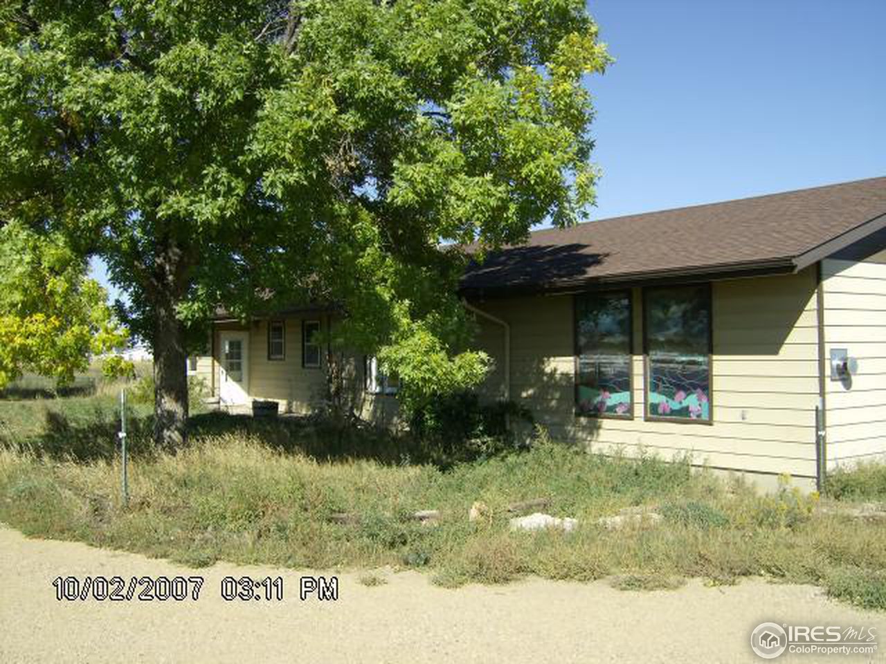2504 South Brehm Road Berthoud, CO 80513 - Photo 1 of 8 a view of a house with a yard