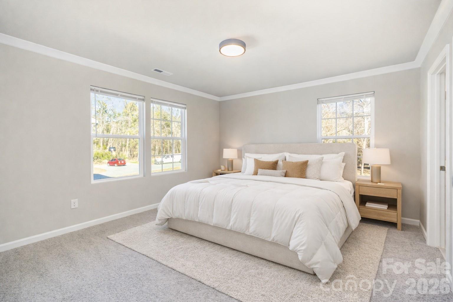 2133 Tom Sadler Road Charlotte, NC 28214 - Photo 13 of 30 a bedroom with a bed and a window