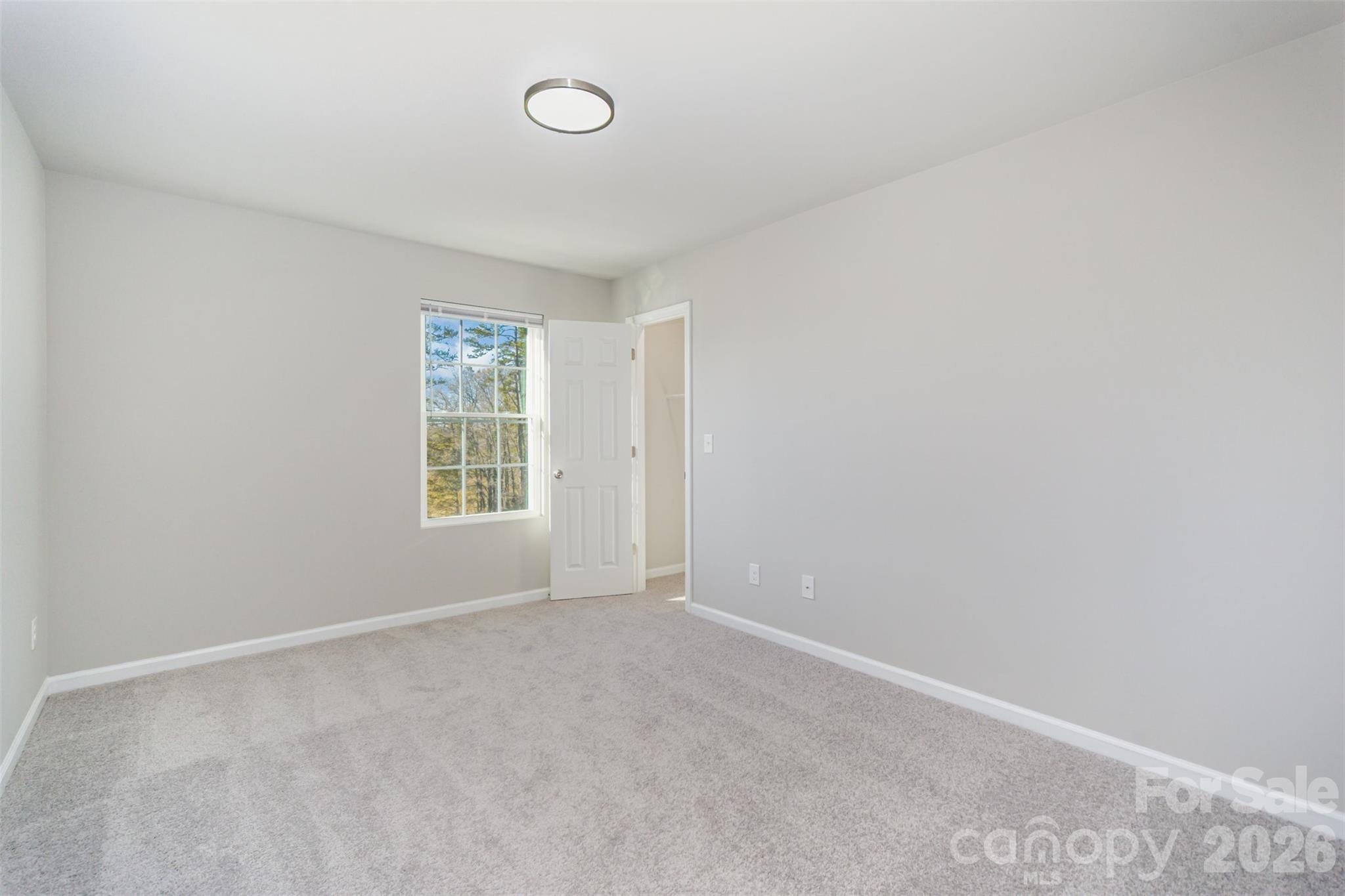 2133 Tom Sadler Road Charlotte, NC 28214 - Photo 20 of 30 an empty room with windows