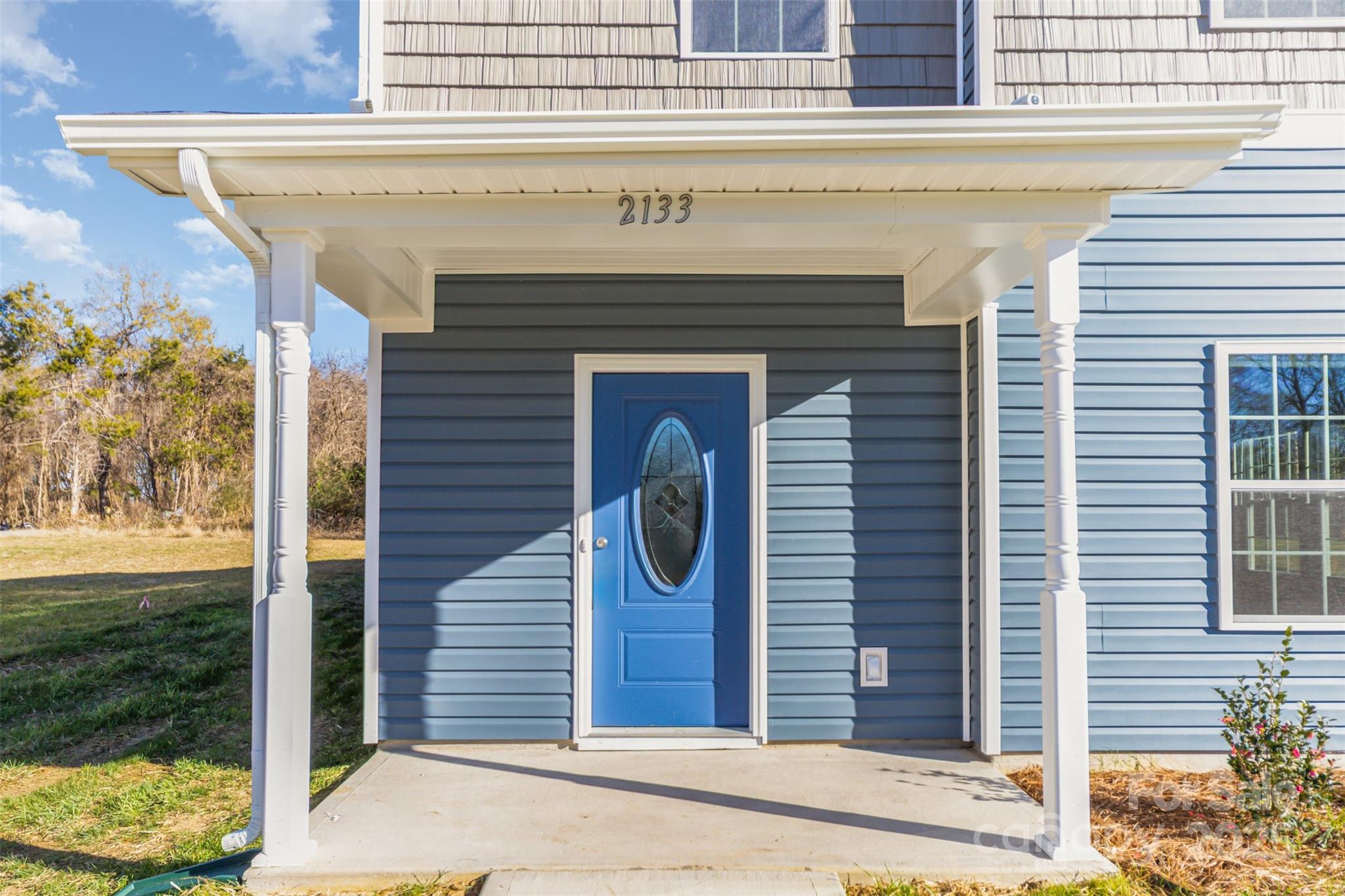 2133 Tom Sadler Road Charlotte, NC 28214 - Photo 2 of 27 a front view of a house with garden